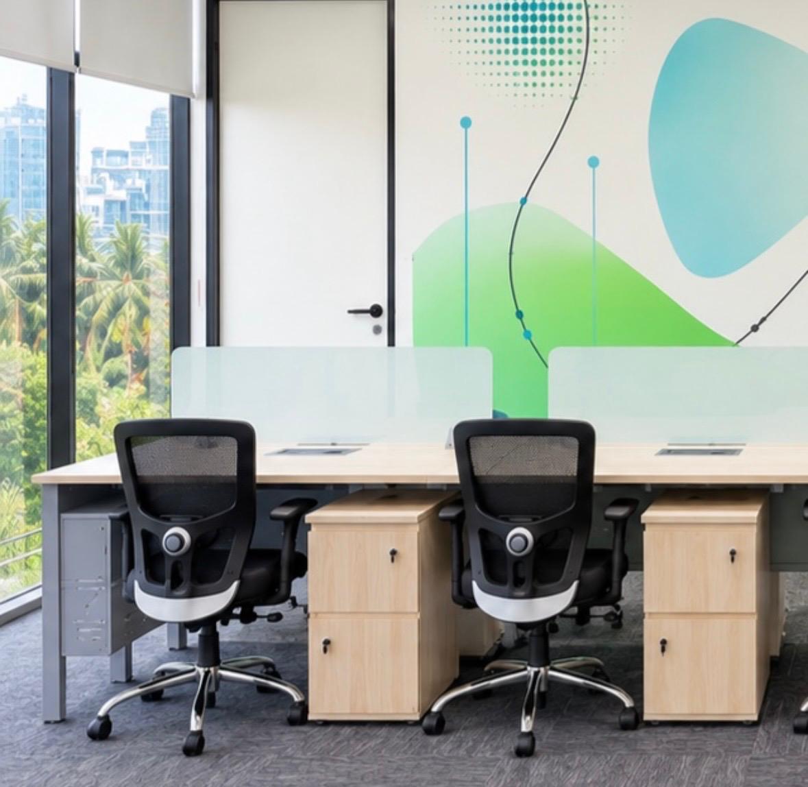 Workstation setup against vibrant abstract wall art